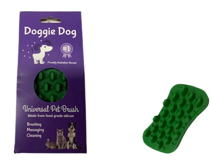 Green pet brush with purple packaging labeled 'Doggie Dog' on a white background