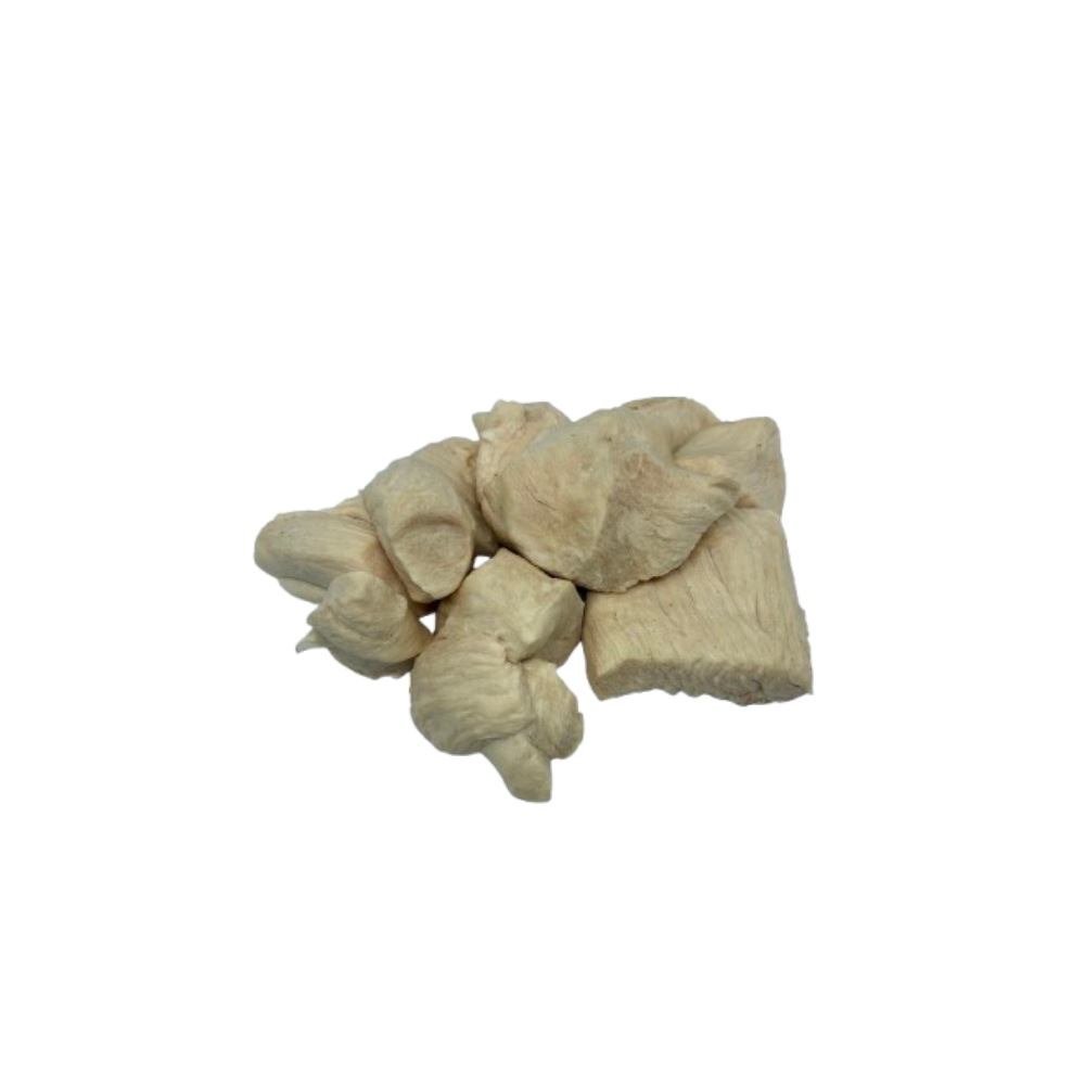 Pile of dried garlic bulbs on a white background