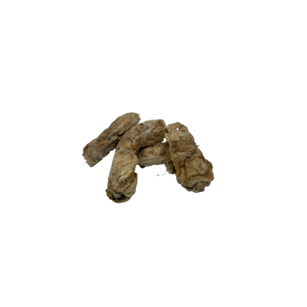 Brown dried roots or herbs on a white background