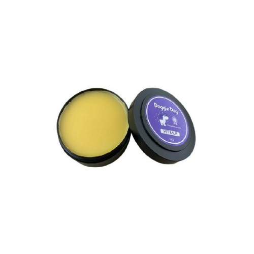 Pet salve container with purple label on a white background