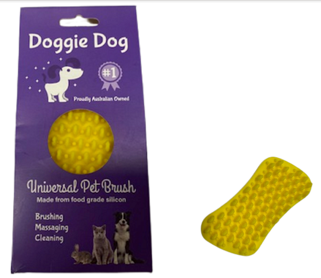 Yellow pet brush with purple packaging labeled 'Doggie Dog' on a white background